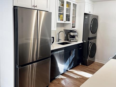 French-door fridge and stacked washer and dryer